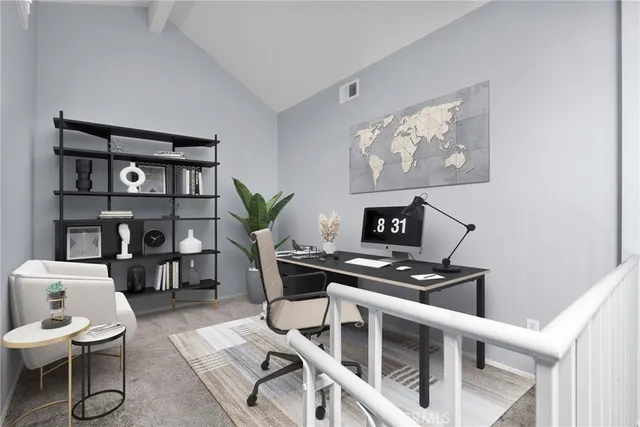 a table room with furniture and a bookshelf