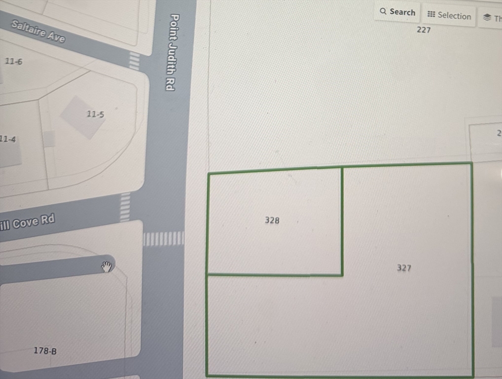 0 Point Judith Road Narragansett, RI 02882 - Photo 5 of 11 a white refrigerator freezer sitting inside of a kitchen