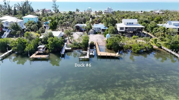 a view of a golf course with a lake