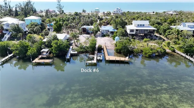 a view of a golf course with a lake