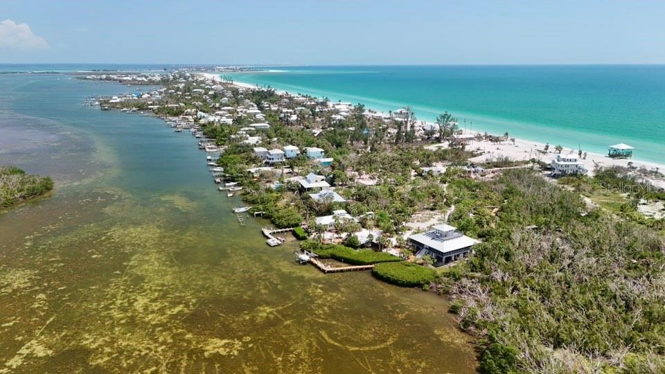 8092 Little Gasparilla Placida, FL 33946 - Photo 9 of 24 a view of a lake with beach