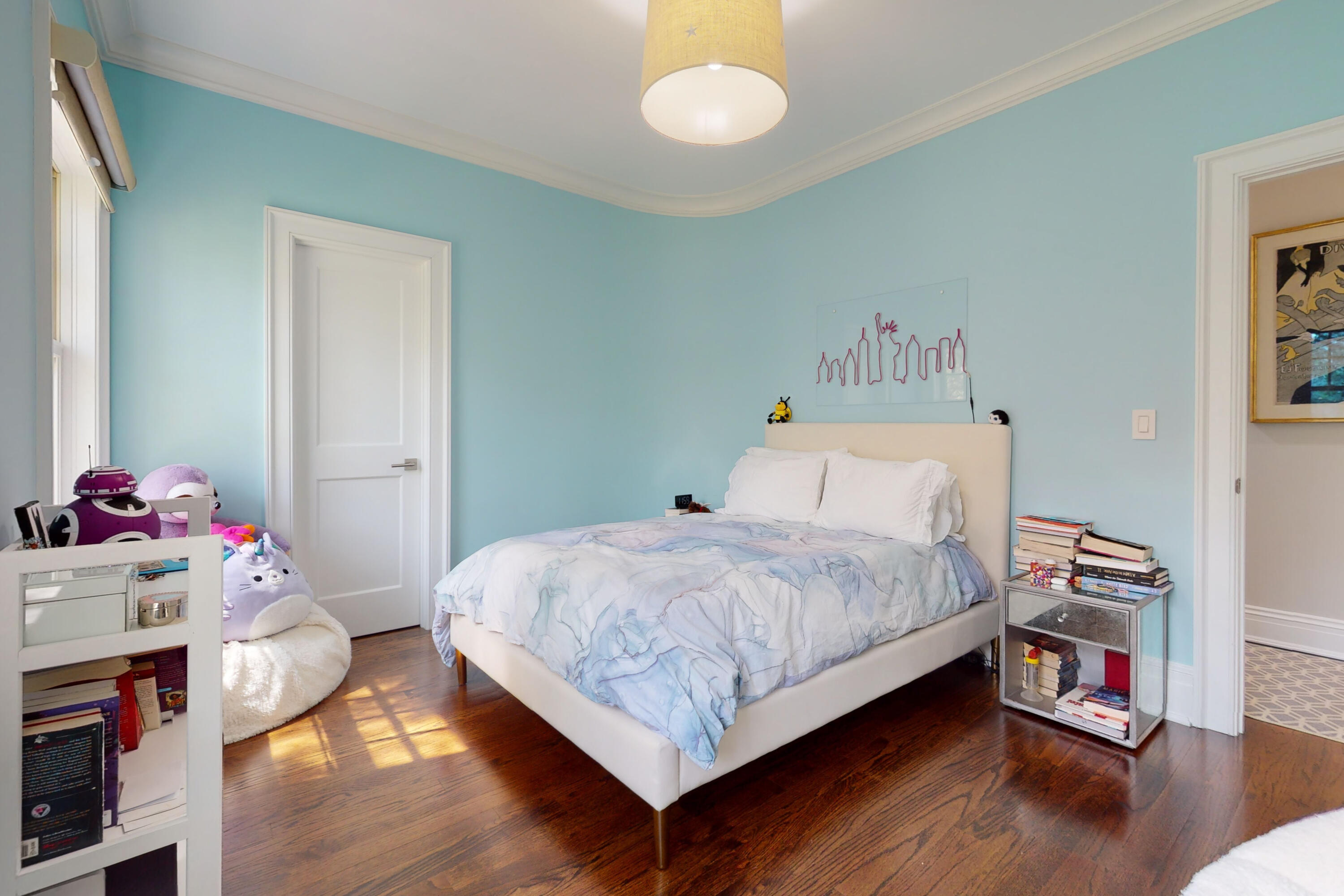 18 Cat Rock Road Cos Cob, CT 06807 - Photo 20 of 37 a bedroom with a bed and a bookshelf