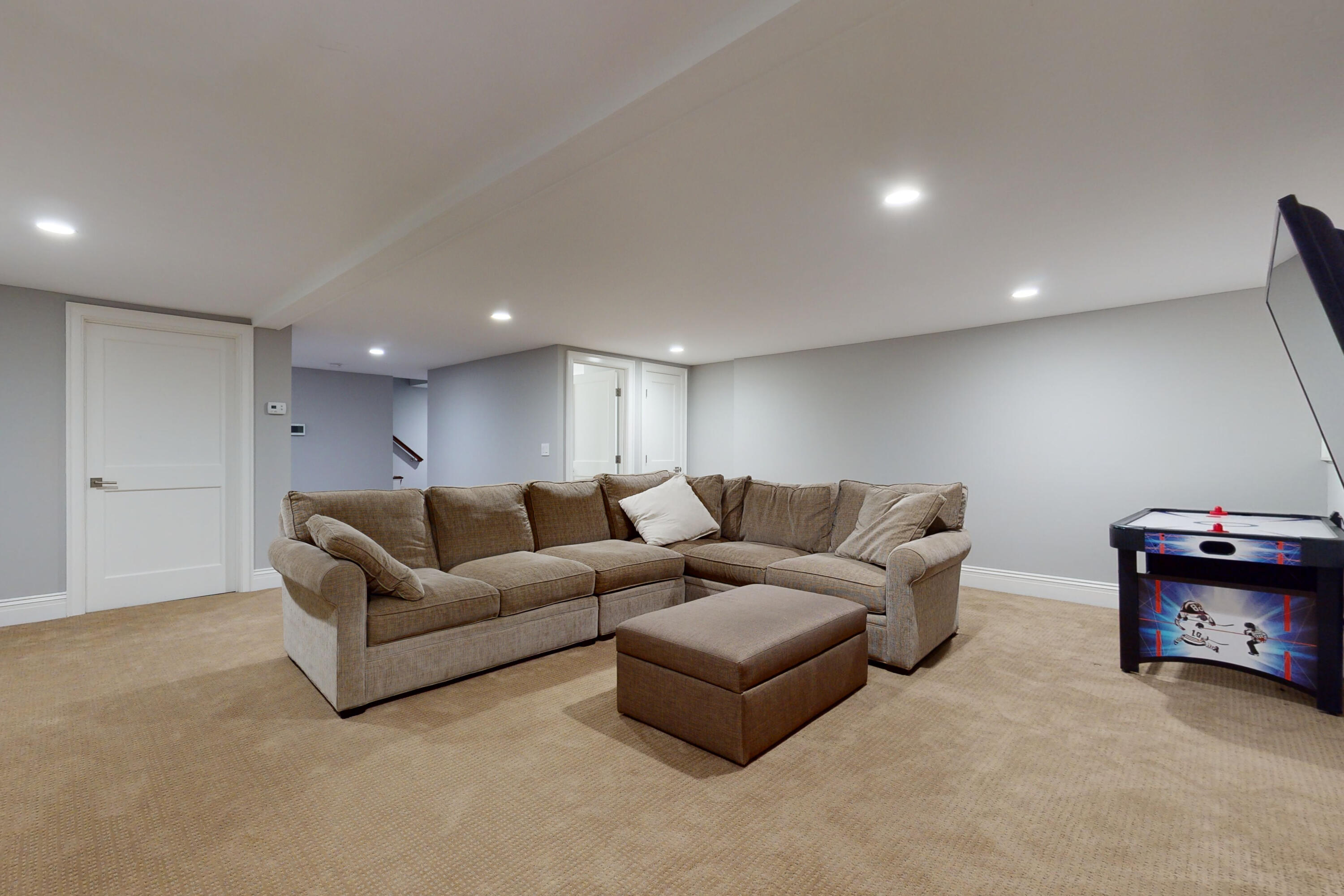 18 Cat Rock Road Cos Cob, CT 06807 - Photo 29 of 37 a living room with furniture and a gym machine