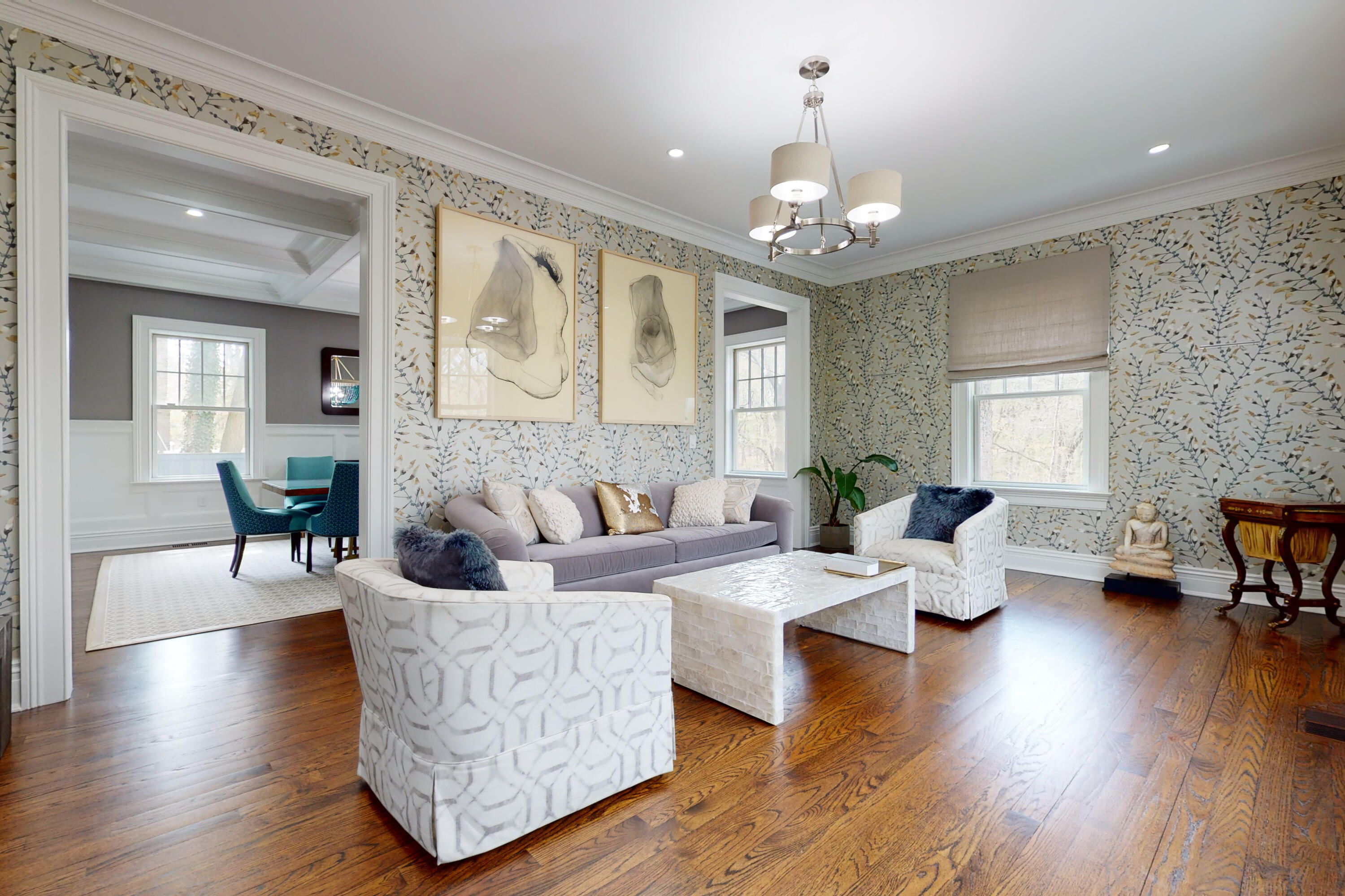 18 Cat Rock Road Cos Cob, CT 06807 - Photo 3 of 37 a living room with couches a fireplace and dining table with wooden floor