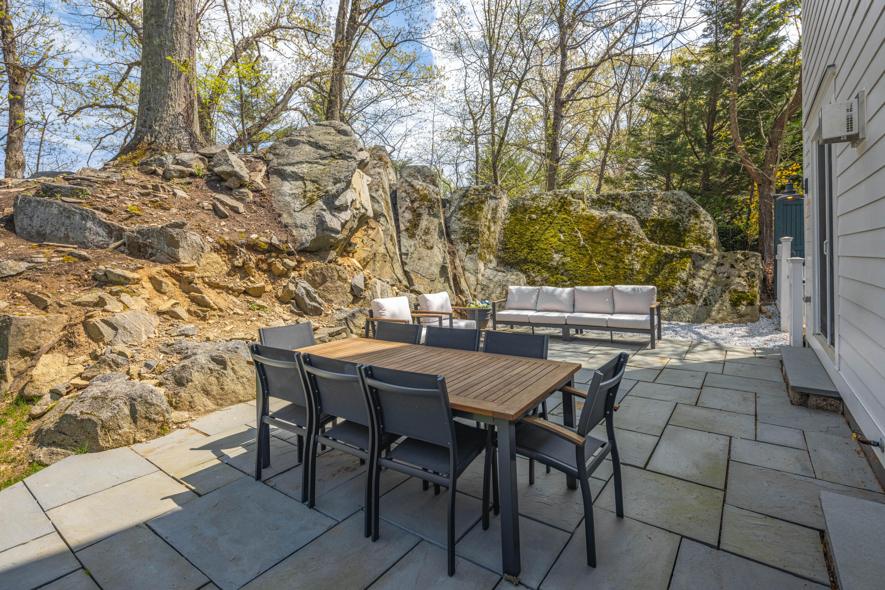 18 Cat Rock Road Cos Cob, CT 06807 - Photo 32 of 37 a view of a backyard with table and chairs
