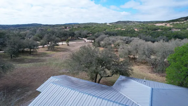 a view of a backyard with mountain view