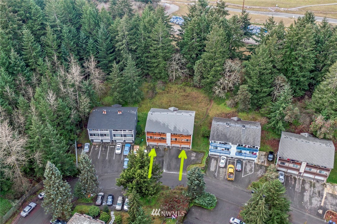 3941 Mason Loop Road Tacoma, WA 98409 - Photo 14 of 16 an aerial view of a house with a garden space and a street view