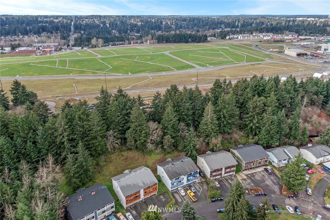 3941 Mason Loop Road Tacoma, WA 98409 - Photo 15 of 16 a view of a tennis court