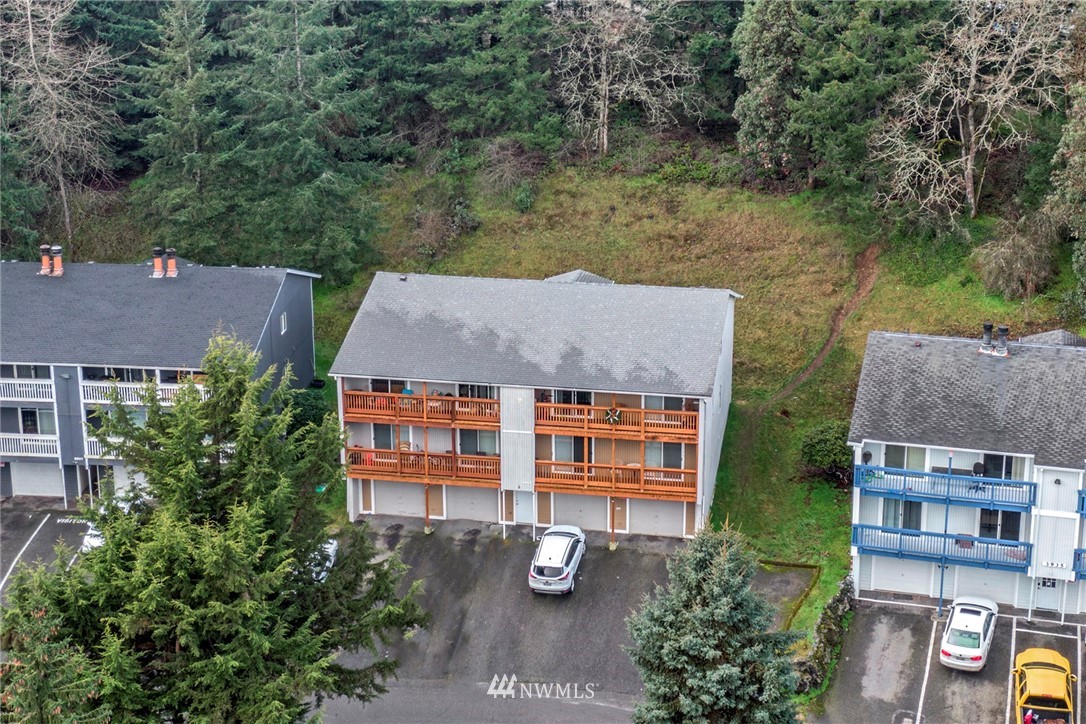 3941 Mason Loop Road Tacoma, WA 98409 - Photo 10 of 16 an aerial view of a house