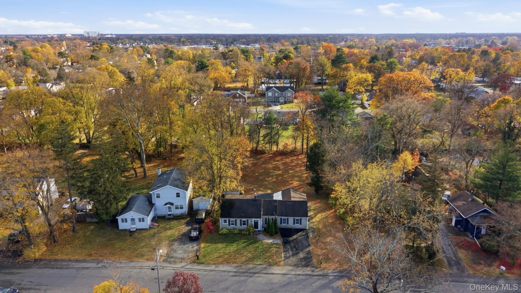 36 Ralph Avenue Brentwood, NY 11717 - Photo 3 of 25 an aerial view of residential house with outdoor space