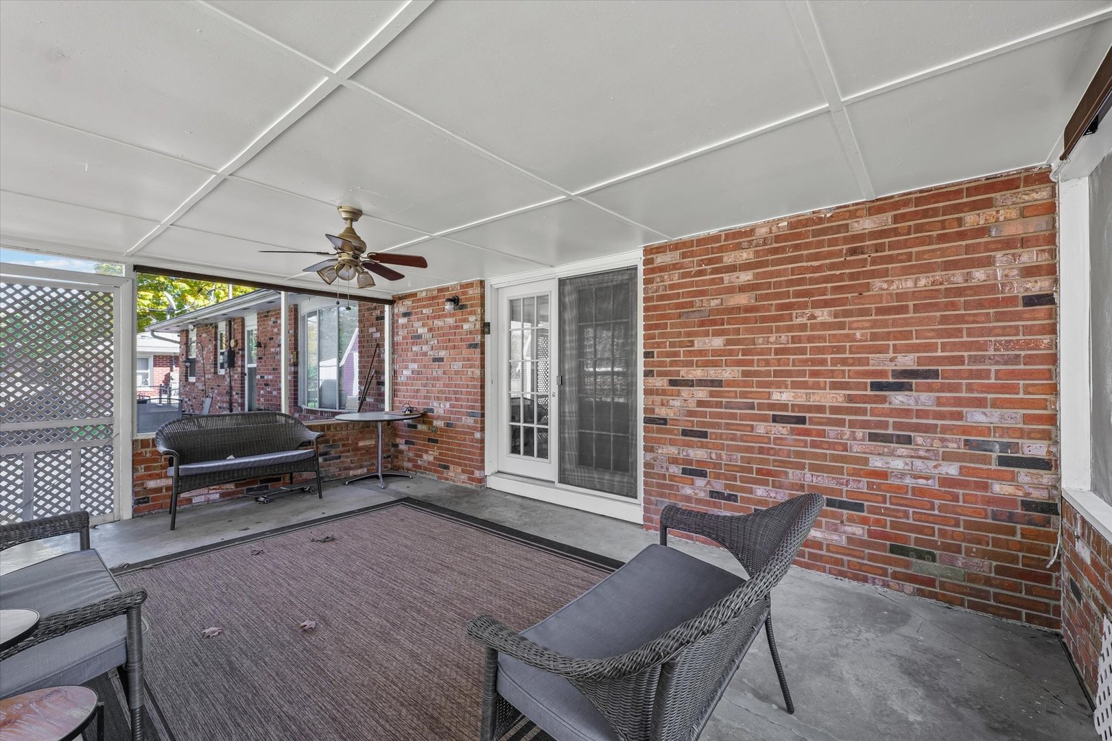 101 Thornhill Drive Danville, IL 61832 - Photo 17 of 42 a living room with patio furniture and a window