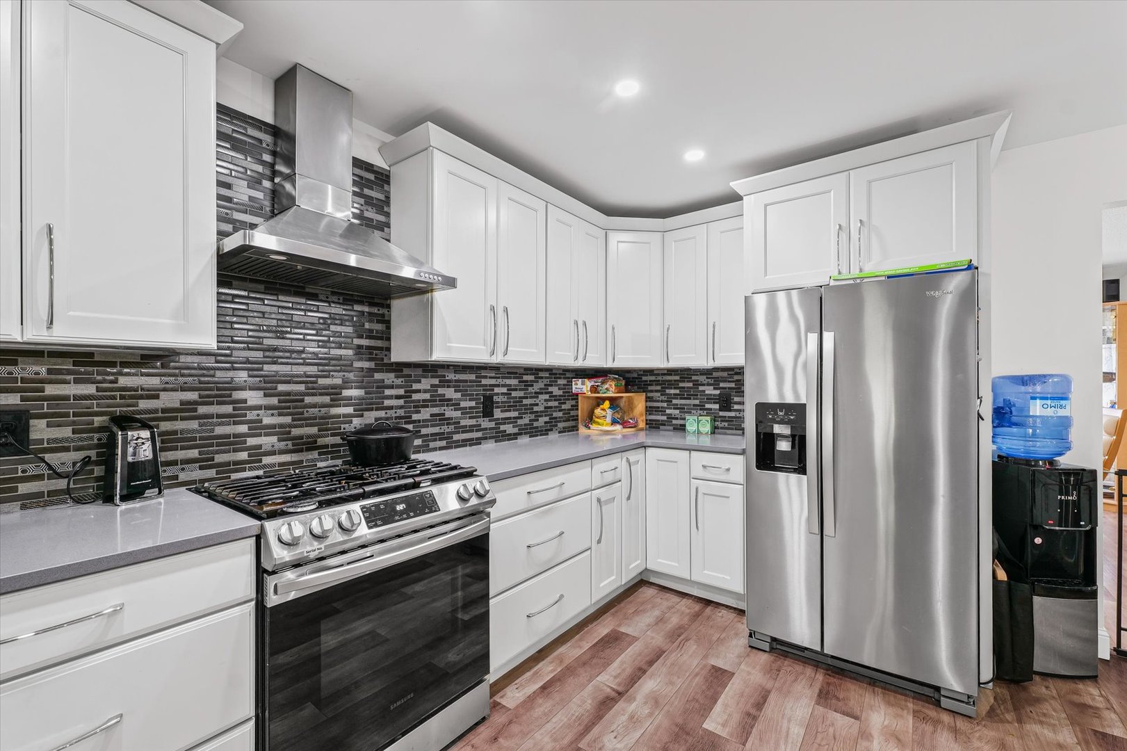 101 Thornhill Drive Danville, IL 61832 - Photo 20 of 42 a kitchen with stainless steel appliances a refrigerator stove and sink