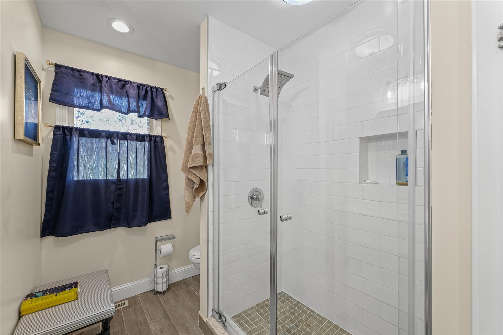 101 Thornhill Drive Danville, IL 61832 - Photo 22 of 42 a bathroom with a shower a toilet and sink