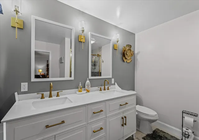 a bedroom with a bed dresser and a window