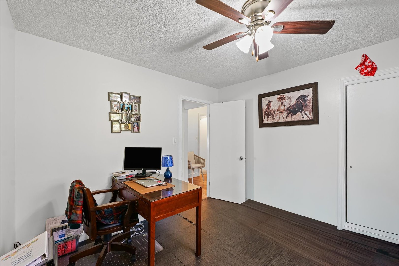 101 Thornhill Drive Danville, IL 61832 - Photo 31 of 42 a workspace with furniture and wooden floor