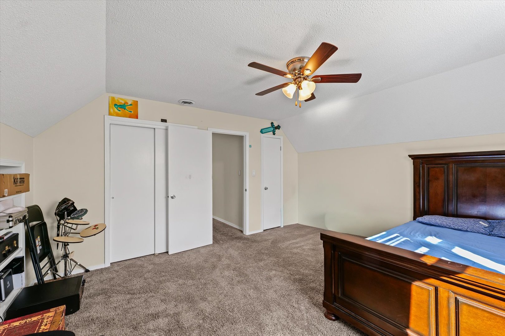 101 Thornhill Drive Danville, IL 61832 - Photo 34 of 42 a bedroom with a bed and a chandelier