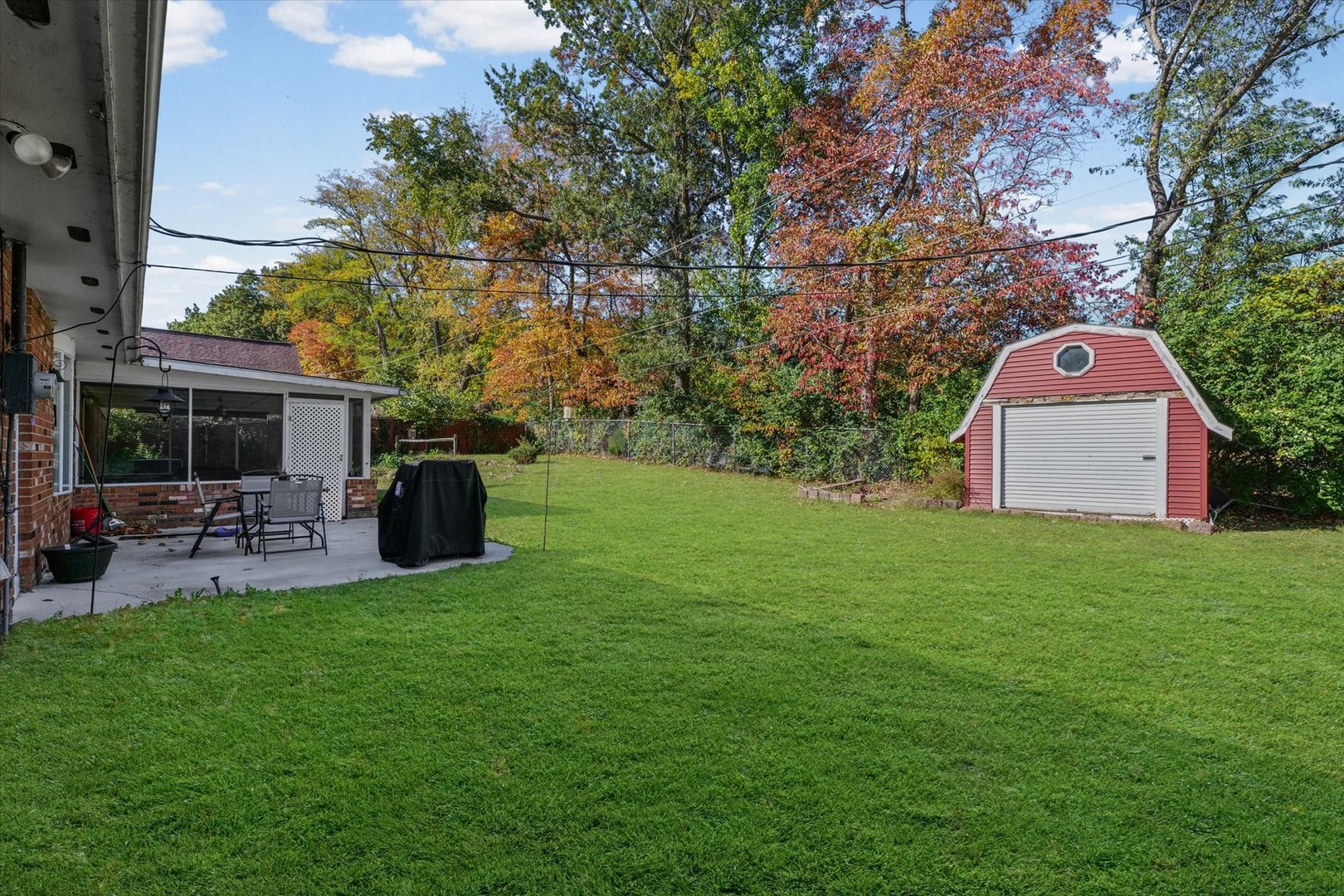 101 Thornhill Drive Danville, IL 61832 - Photo 37 of 42 a view of a backyard with sitting area and garden