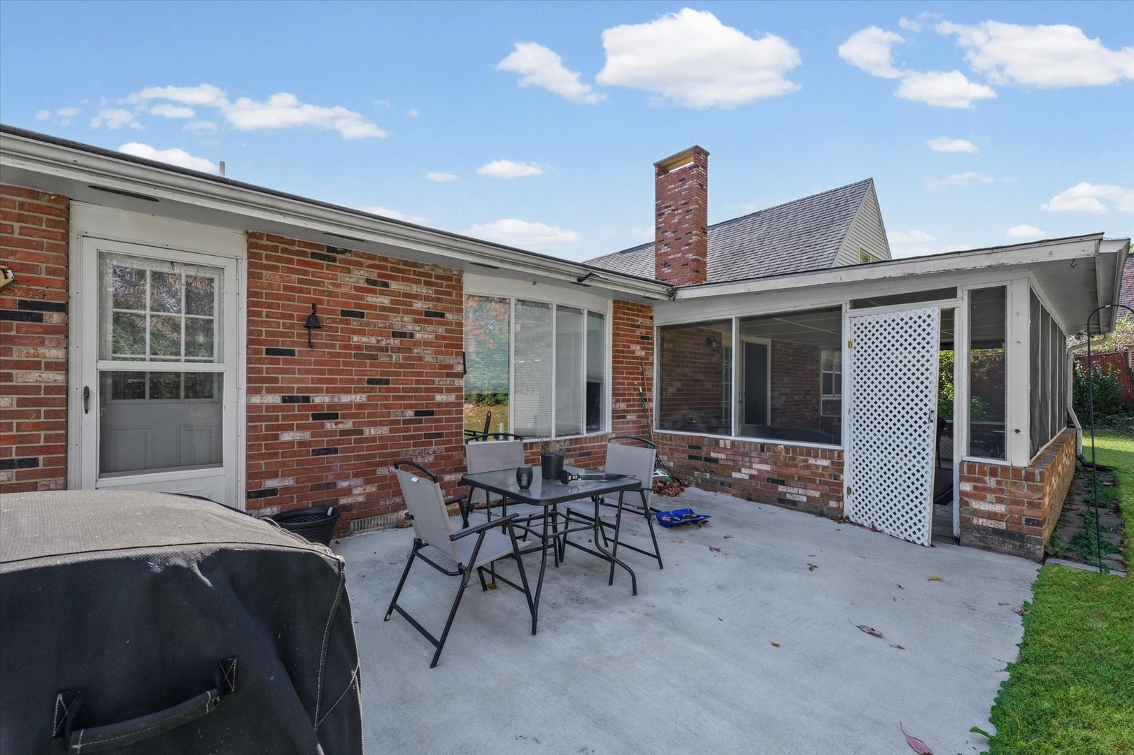 101 Thornhill Drive Danville, IL 61832 - Photo 38 of 42 a backyard of a house with outdoor seating