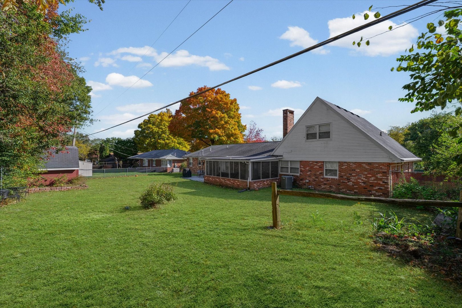 101 Thornhill Drive Danville, IL 61832 - Photo 39 of 42 a front view of house with a garden and trees