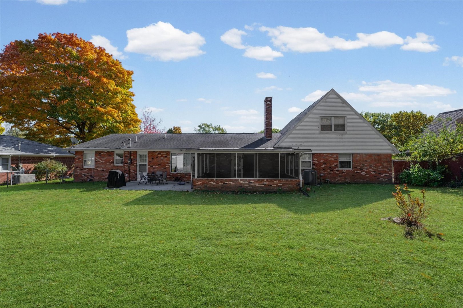 101 Thornhill Drive Danville, IL 61832 - Photo 40 of 42 a front view of a house with garden