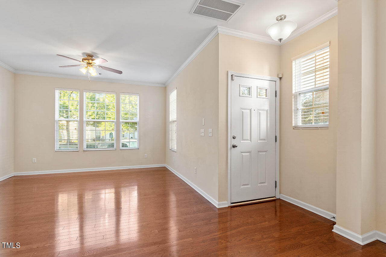 864 Cupola Drive Raleigh, NC 27603 - Photo 5 of 26 Living room with lots of windows