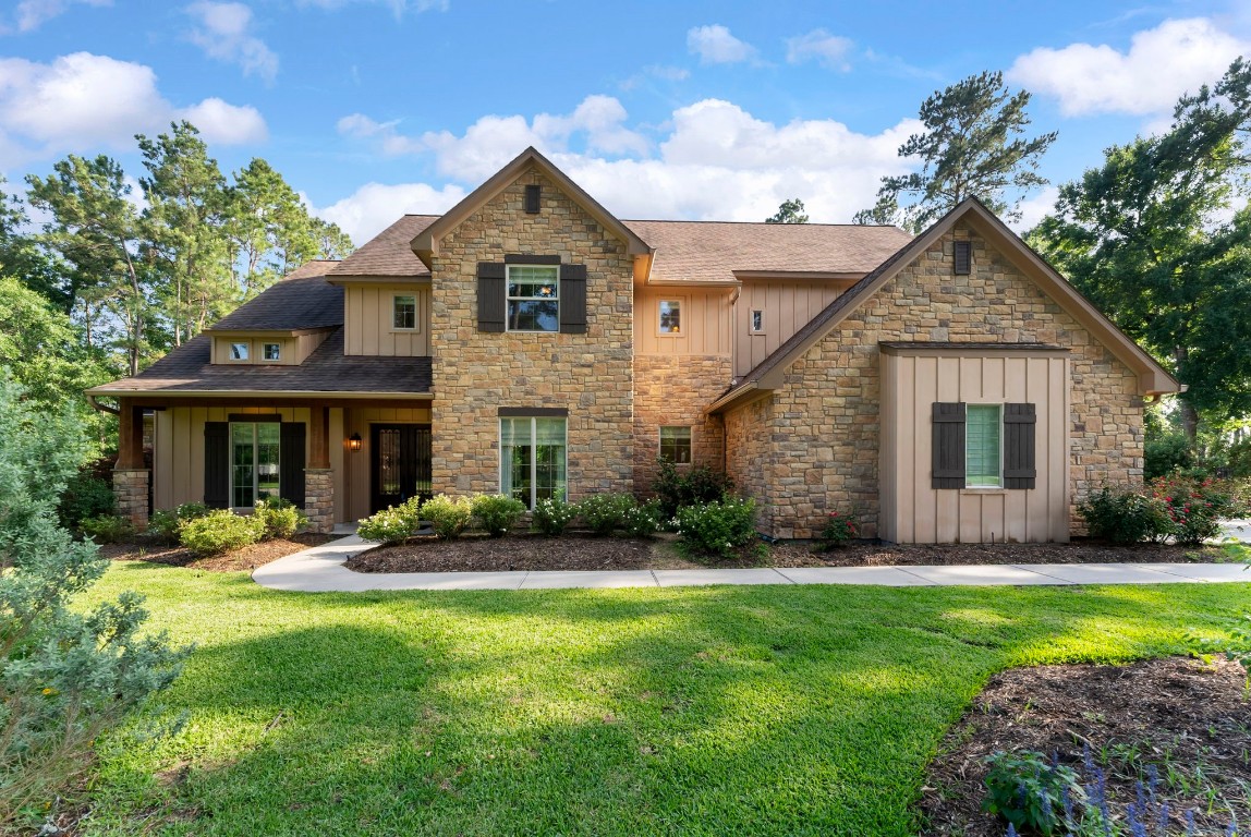 3810 Oreana Court Spring, TX 77386 - Photo 1 of 44 a front view of a house with a yard and porch