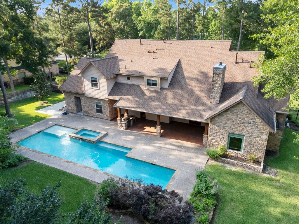 3810 Oreana Court Spring, TX 77386 - Photo 2 of 44 an aerial view of a house with swimming pool garden and patio