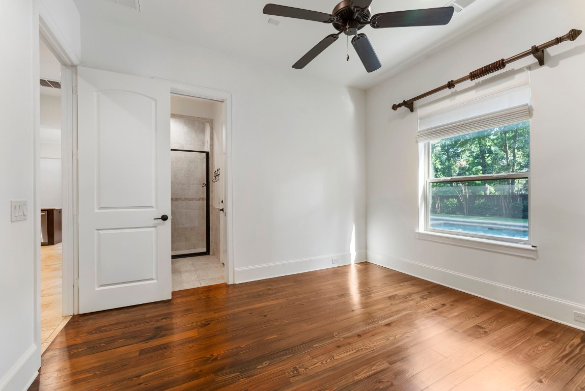 3810 Oreana Court Spring, TX 77386 - Photo 23 of 44 a view of an empty room with wooden floor and a window