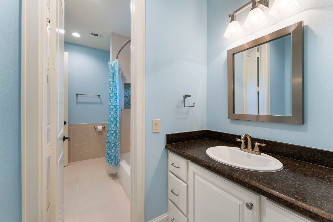 3810 Oreana Court Spring, TX 77386 - Photo 26 of 44 a bathroom with a sink and a mirror