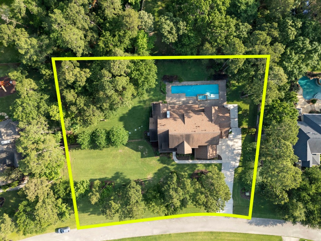 3810 Oreana Court Spring, TX 77386 - Photo 3 of 44 an aerial view of a house with a yard