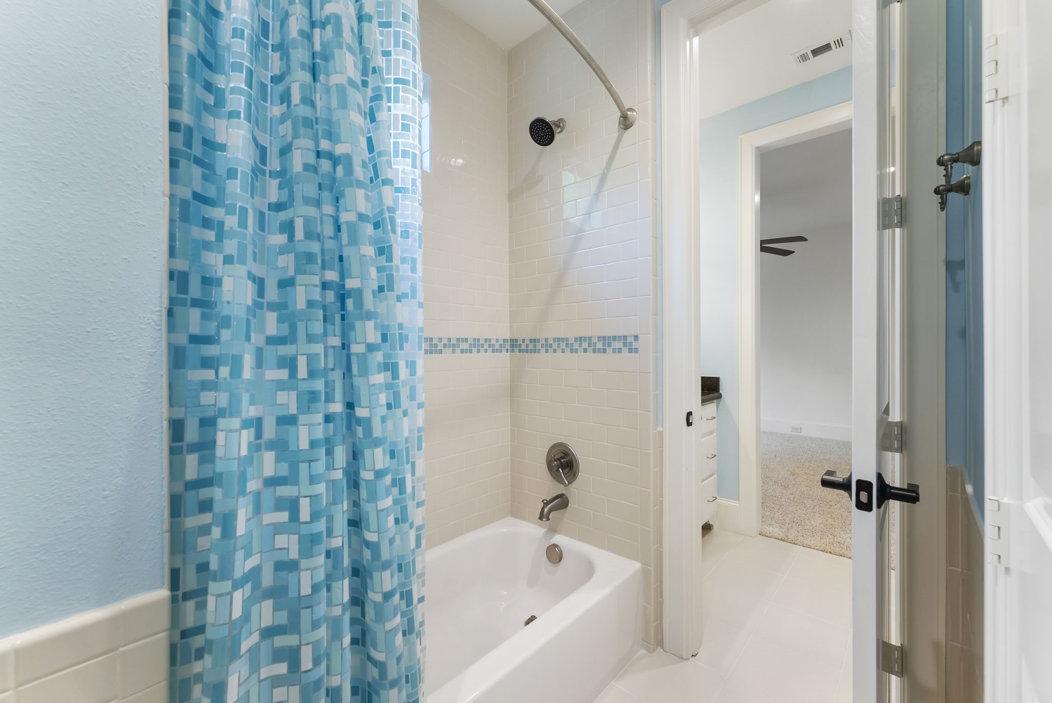 3810 Oreana Court Spring, TX 77386 - Photo 32 of 44 a bathroom with a bathtub and shower