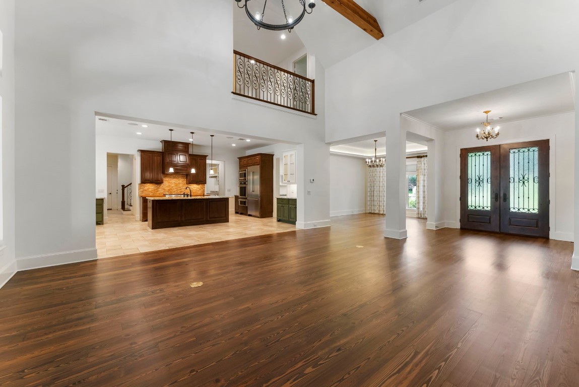 3810 Oreana Court Spring, TX 77386 - Photo 6 of 44 an empty room with wooden floor and windows