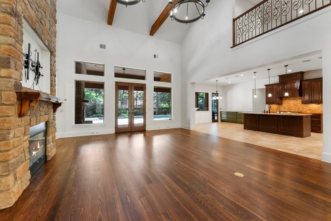 3810 Oreana Court Spring, TX 77386 - Photo 7 of 44 a view of an empty room with wooden floor and a fireplace