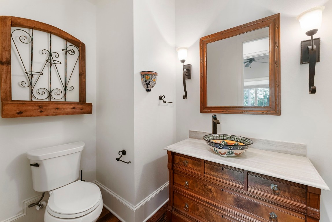 3810 Oreana Court Spring, TX 77386 - Photo 10 of 44 a bathroom with a toilet sink and mirror