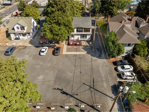 an aerial view of a house with a garden