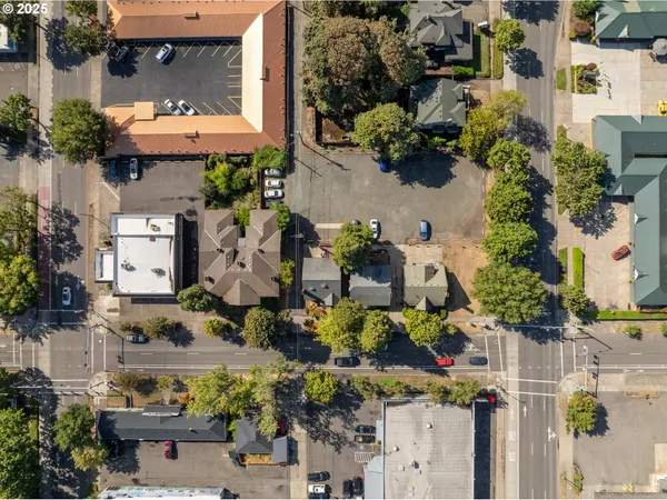 an aerial view of a building with outdoor space