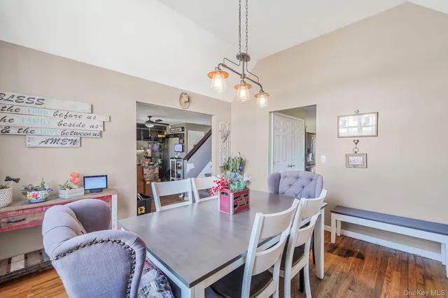 a view of a dining room with furniture