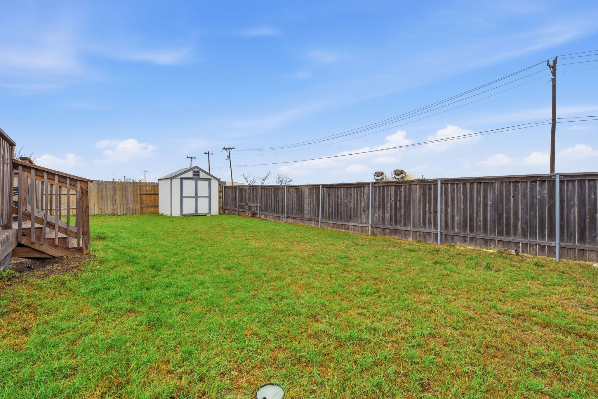 626 Atlantis Kyle, TX 78640 - Photo 21 of 23 a view of a backyard with wooden fence