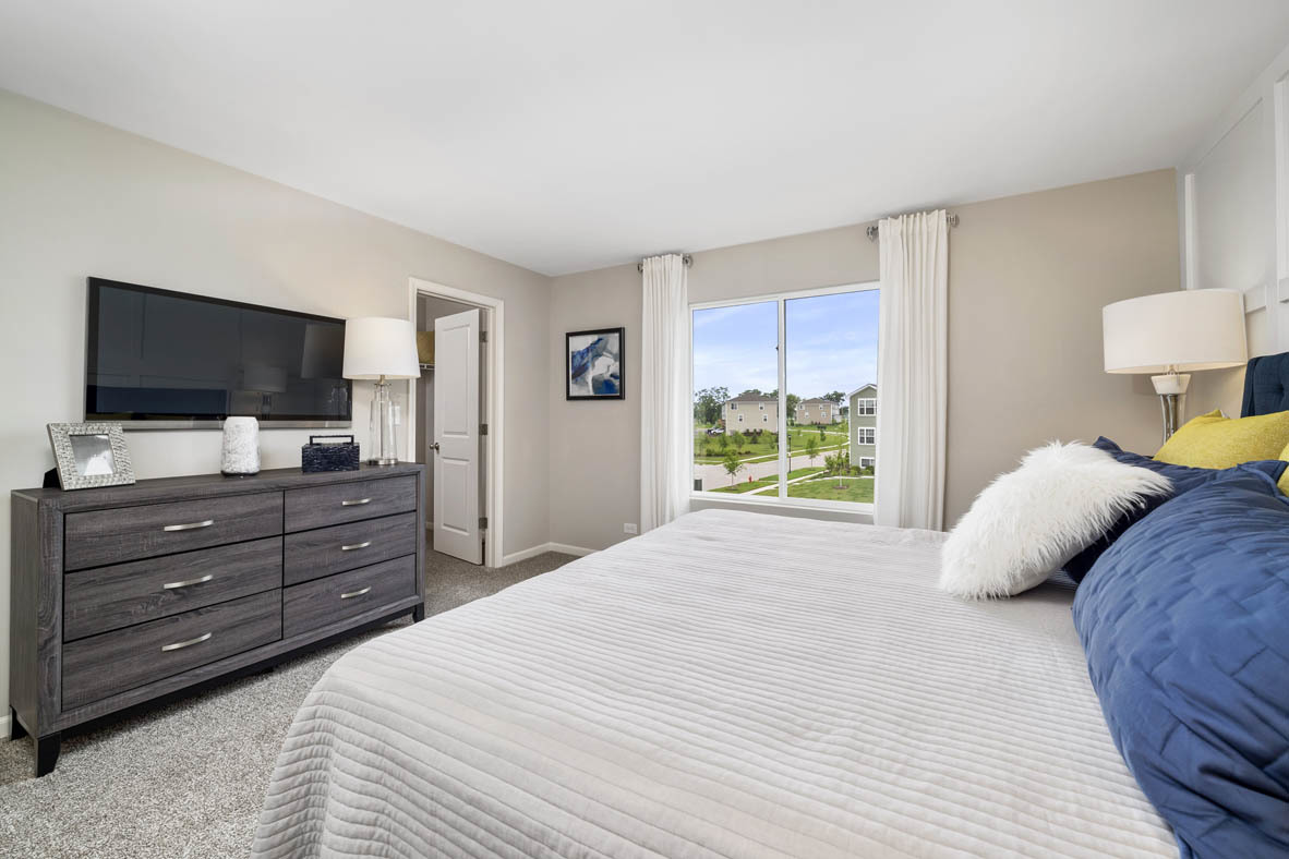 2368 Alison Avenue Pingree Grove, IL 60140 - Photo 14 of 20 a bedroom with a bed and a flat screen tv