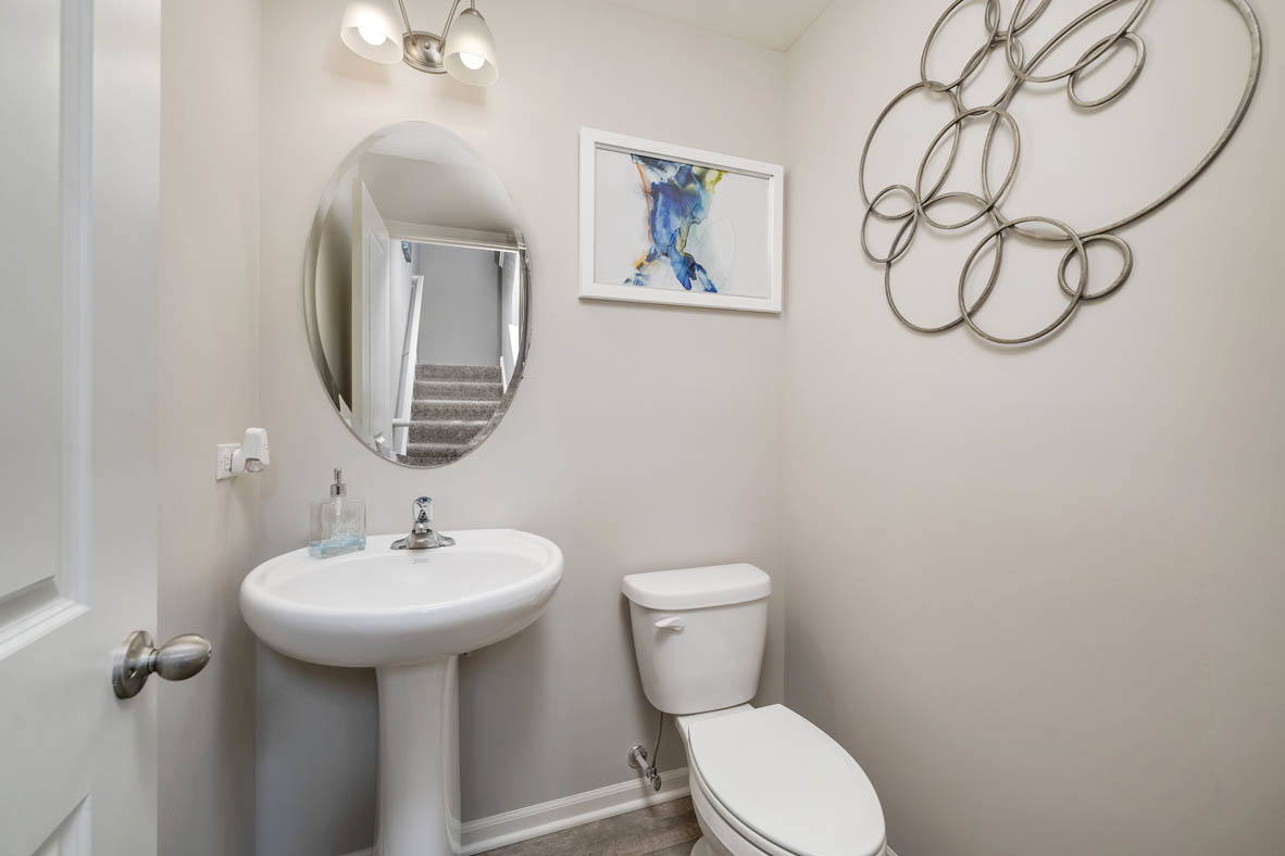 2368 Alison Avenue Pingree Grove, IL 60140 - Photo 10 of 20 a bathroom with a toilet sink and mirror