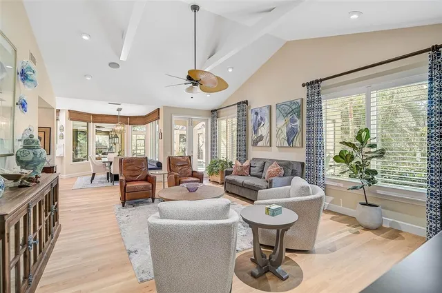 a spacious bathroom with a granite countertop sink a mirror and a