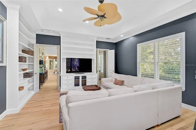 a en suite bathroom with a granite countertop sink and a mirror