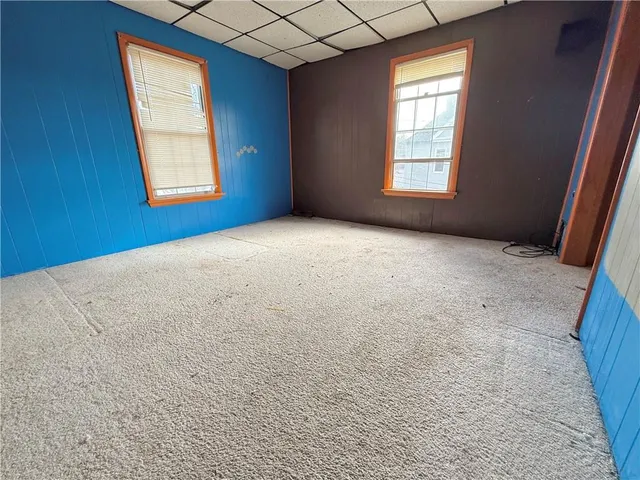 an empty room with windows