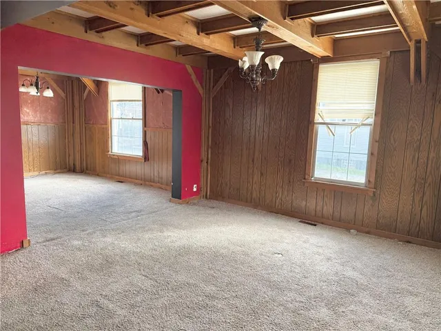 a view of a livingroom with a staircase