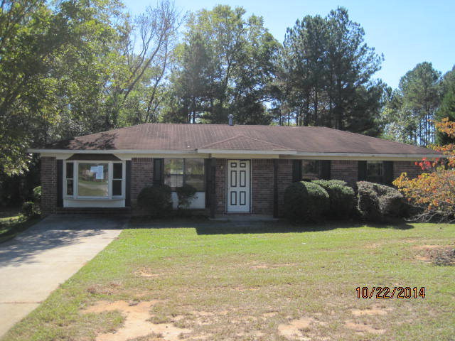 657 River Road Fort Valley, GA 31030 - Photo 1 of 13 a view of a house with garden and yard