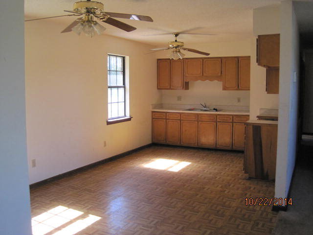 657 River Road Fort Valley, GA 31030 - Photo 4 of 13 a view of a kitchen with a dishwasher and a window