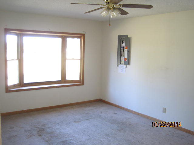 657 River Road Fort Valley, GA 31030 - Photo 6 of 13 an empty room with a window
