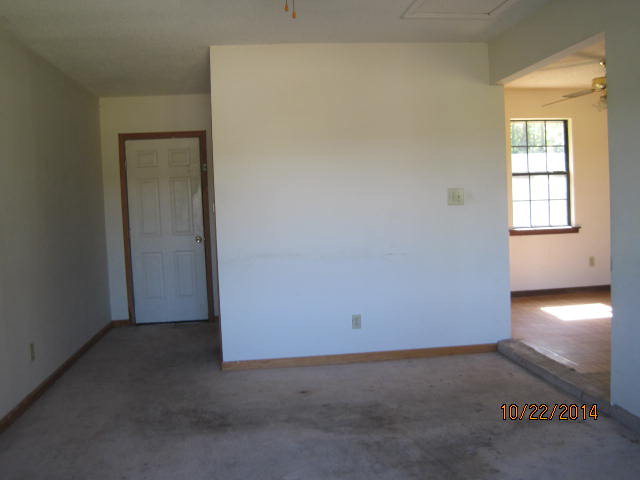 657 River Road Fort Valley, GA 31030 - Photo 7 of 13 an empty room with a empty space and window