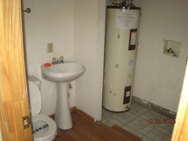 657 River Road Fort Valley, GA 31030 - Photo 8 of 13 a bathroom with a sink and mirror
