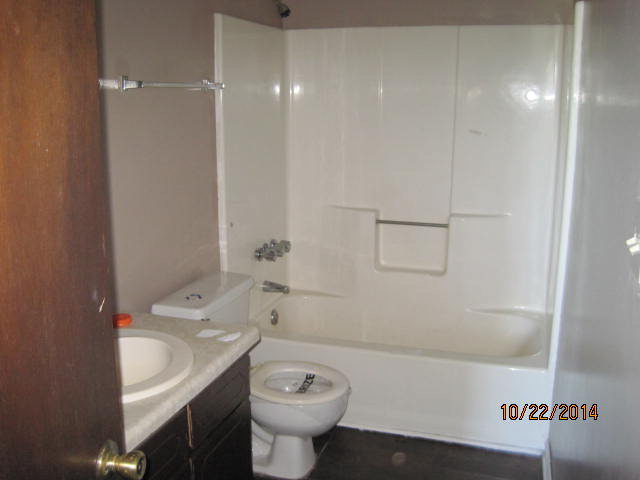 657 River Road Fort Valley, GA 31030 - Photo 10 of 13 a bathroom with a sink toilet and shower
